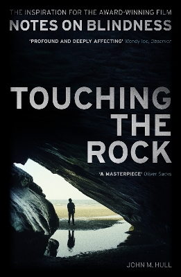 TOUCHING THE ROCK  PB - JOHN M. HULL