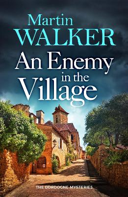 AN ENEMY IN THE VILLAGE PB - MARTIN WALKER